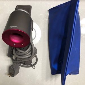 Dyson hair dryer with accessories